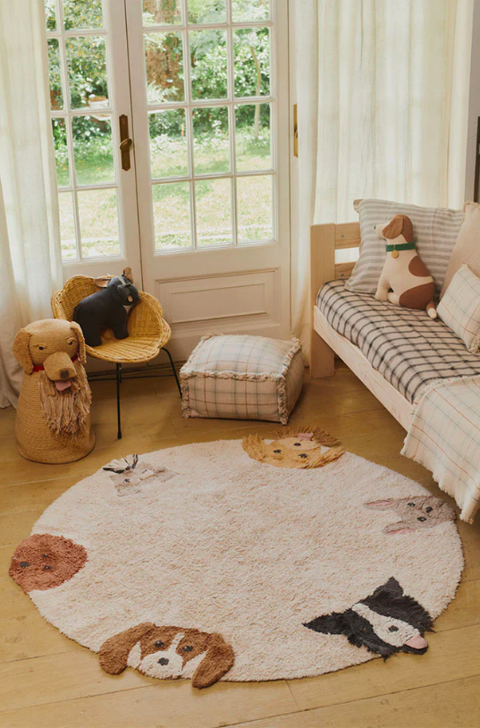 Круглий дитячий килим Dogs від Lorena Canals.
