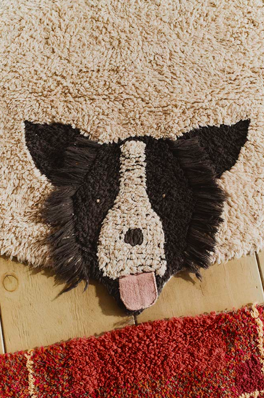 Круглий дитячий килим Dogs від Lorena Canals.