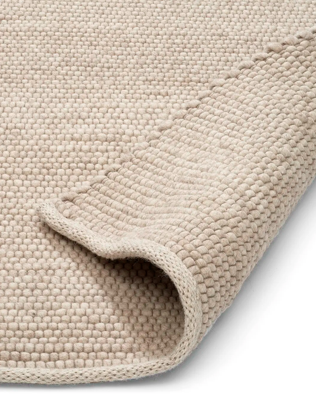 Килим Merino вівсяного кольору від Classic Collection.